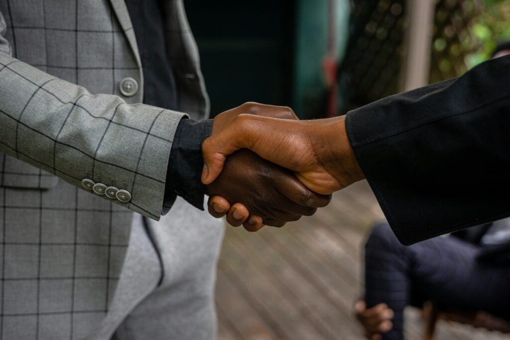 two businessmen shaking hands